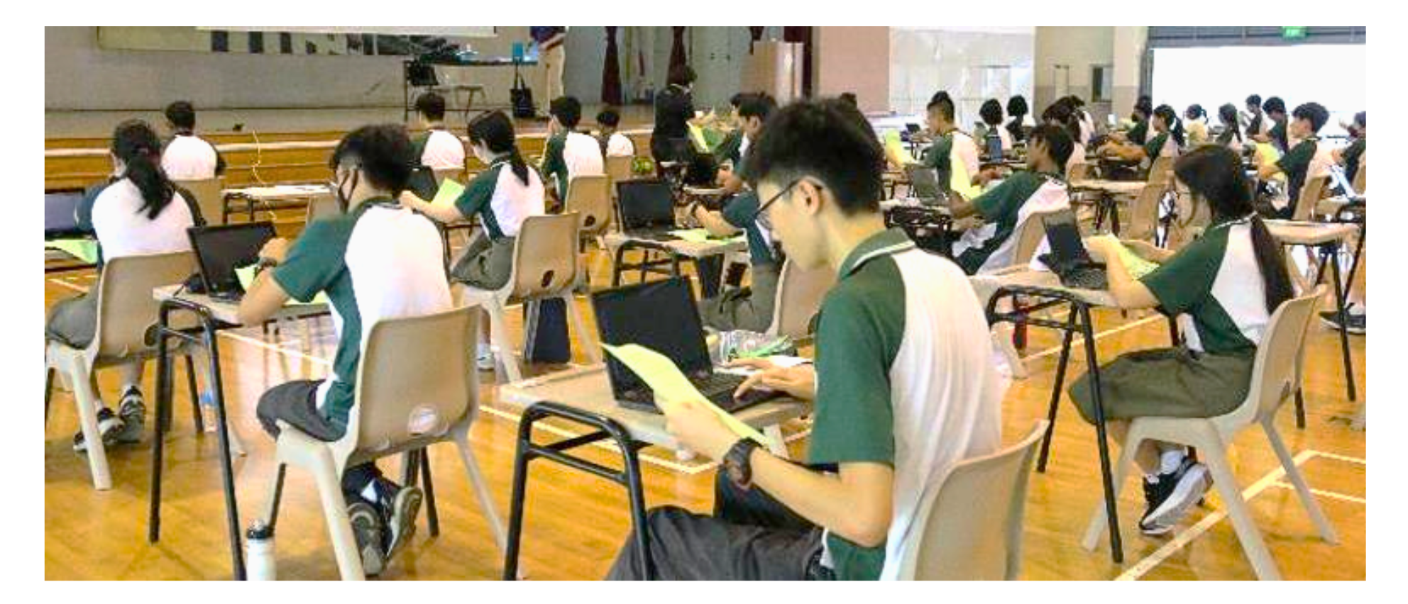 Students use digital answer booklets on their PLDs and refer to hardcopy question paper